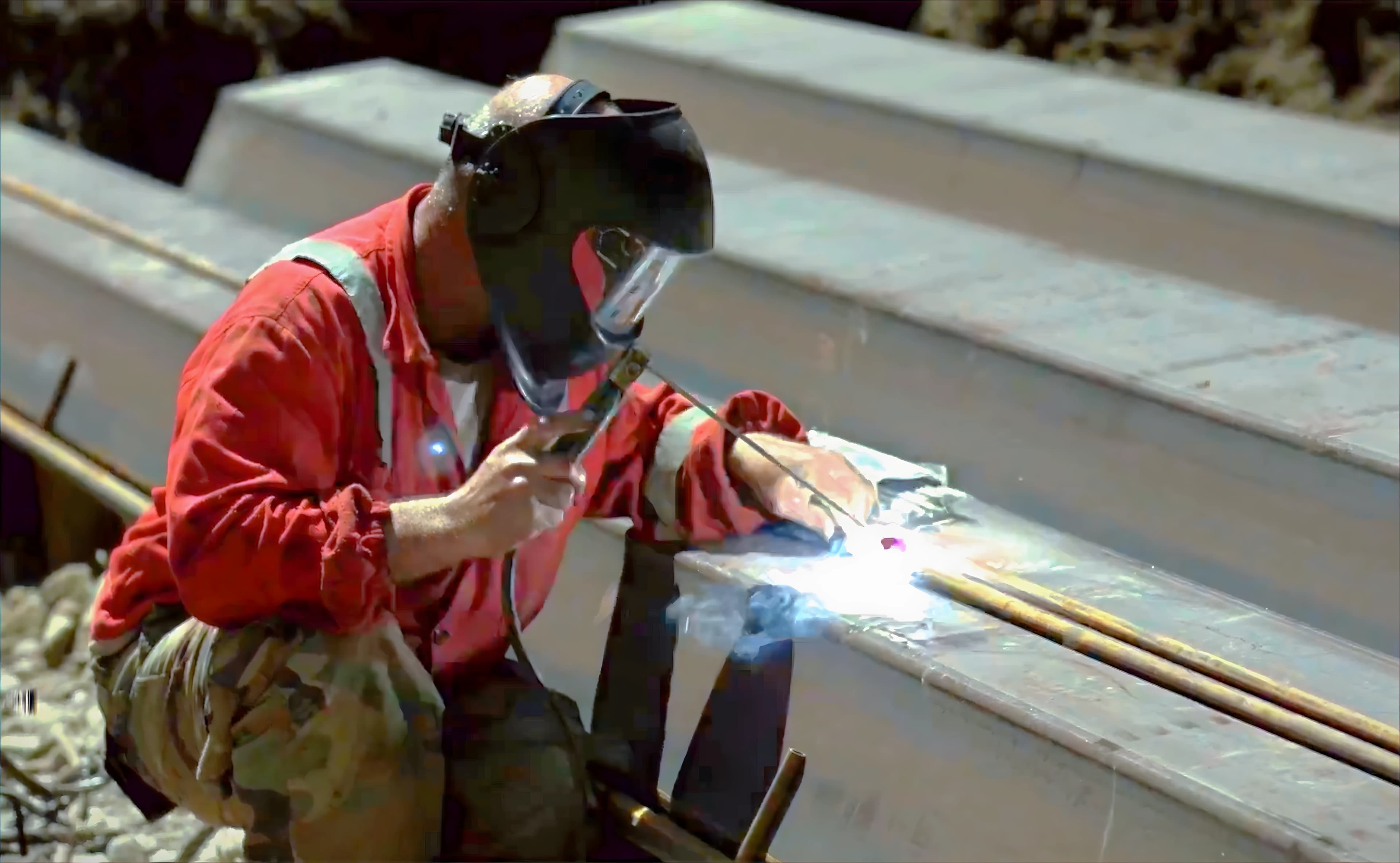 ERTI welder working on site